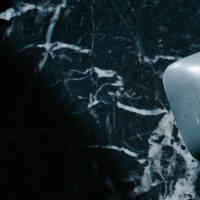 Schmidt's cedarwood & Juniper soap on dark marble background