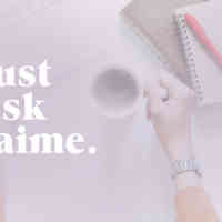 Bird's eye view of desk set up with computer, woman's hand around coffee mug, notebooks and pen with transluscent light purple overlay and white text that reads "just ask jaime"