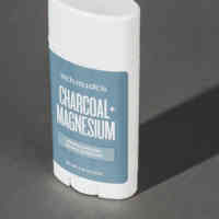 Image of Schmidt's charcoal and magnesium deodorant with shadow behind and gray background