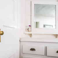 White bathroom counter and mirror